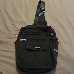 Baggallini sling bag.Multi pockets.Gray.Excellent condition.